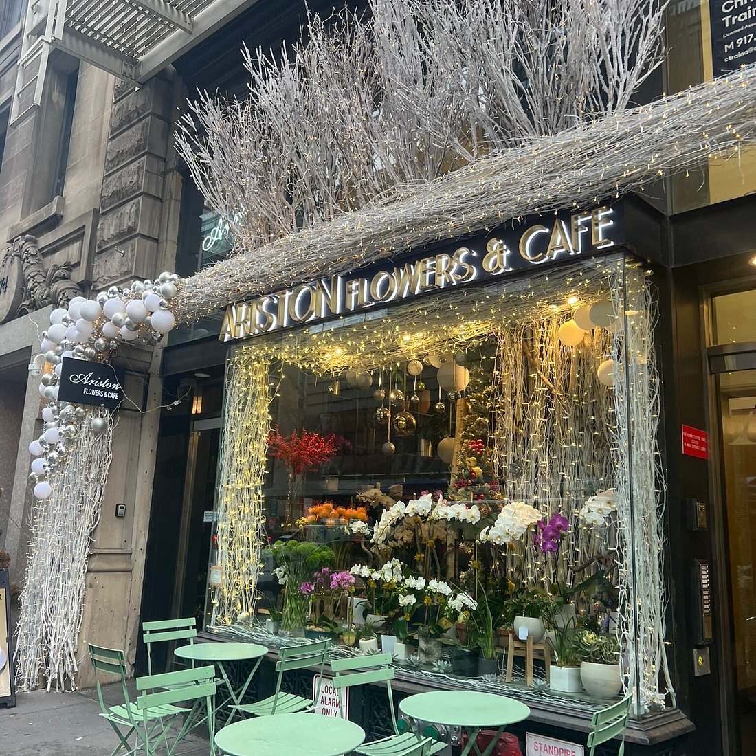 Example of a Spring Sip & Stroll pass shown on a phone with outdoor patios, flowers, and springtime drinks